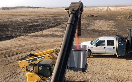 Unloading Treated Seed